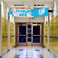 Across the hallway banner for schools