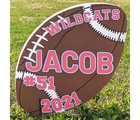 Football shaped yard sign
