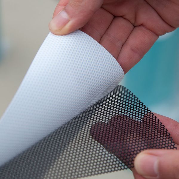 Peel the protective cover of the vinyl before applying to surfaces Perforated Window Decals