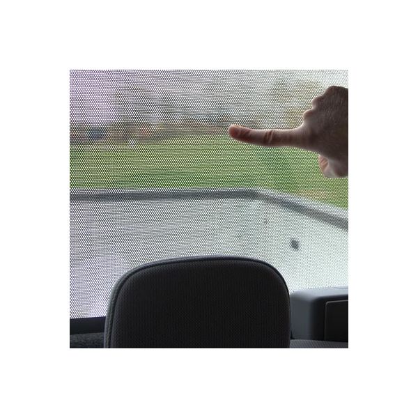 Other side of window is still visible One-Way Visions