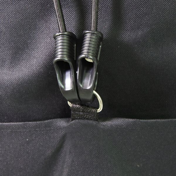 Bag is connected to the trolley with included bungee cords