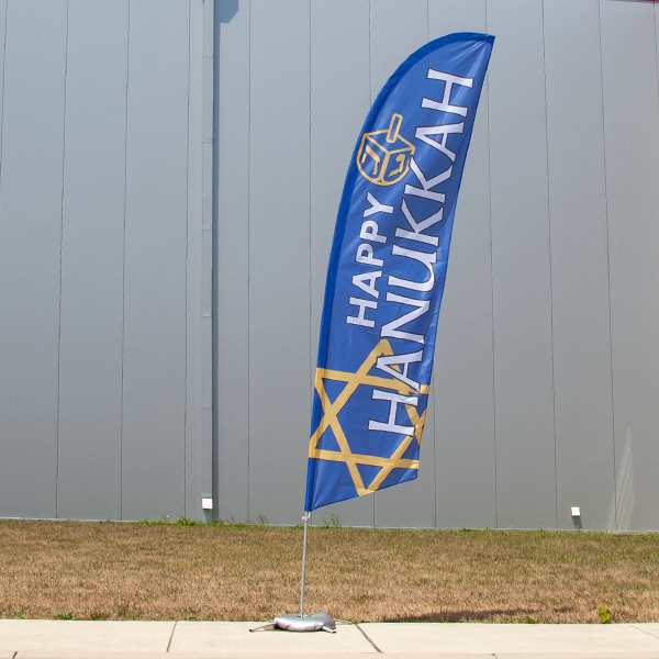 Happy Hanukkah flag outdoors