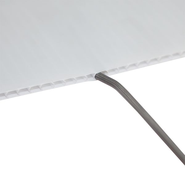 Stakes are inserted into the flutes of the corrugated plastic baseball yard signs. Yard stake inserted in flute of baseball yard signs