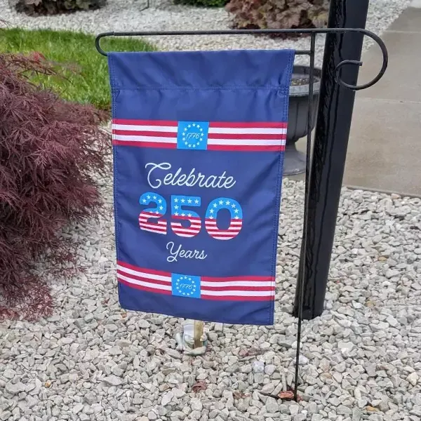 Garden flag hanging in front of a house