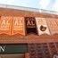 High school championship banners displayed outside a building High school championship banners