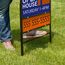 Sign frame stakes into soft ground Stake bottom on frame