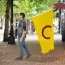 Carry your pride flag on a handheld pole